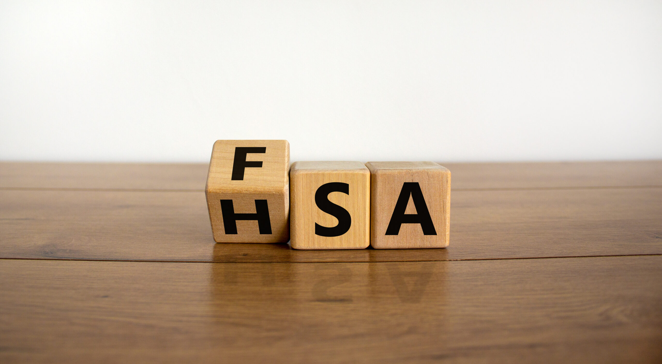 3 wooden blocks flipping from FSA to HSA