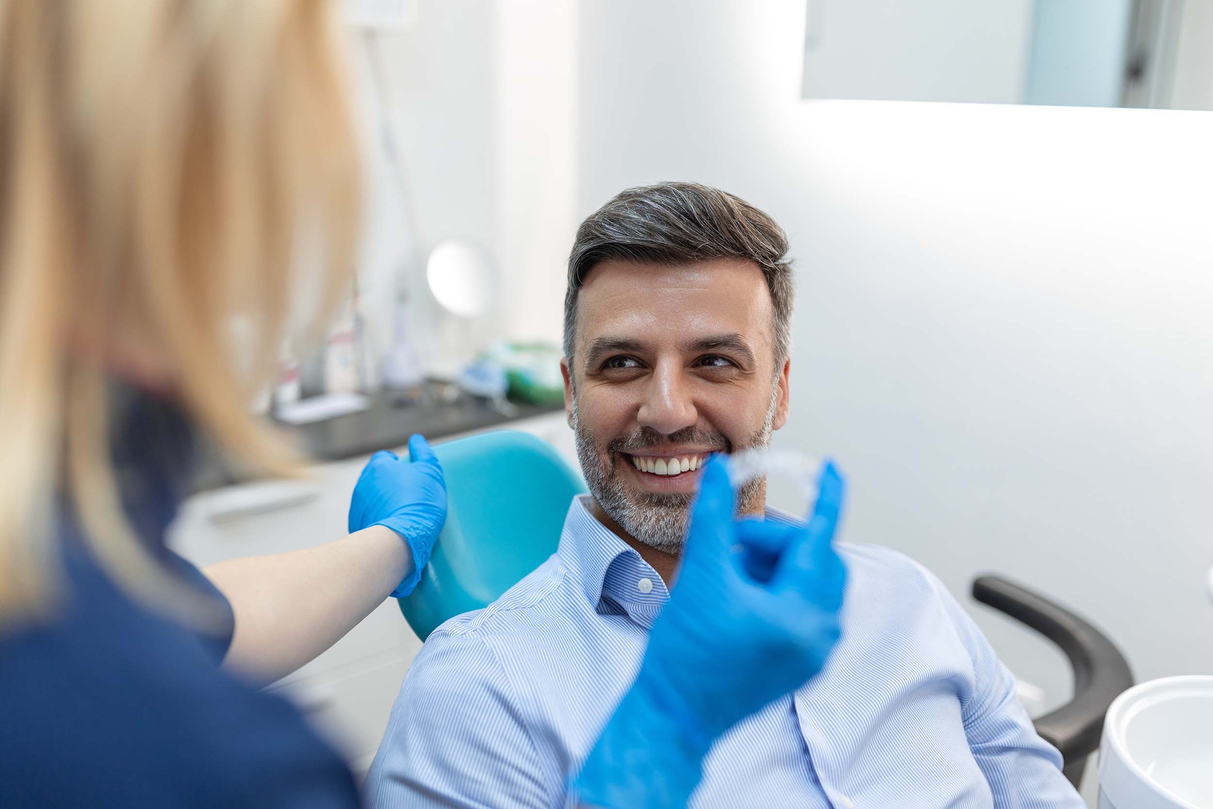 Orthodontist answering questions that are relevant to adult orthodontic treatment.