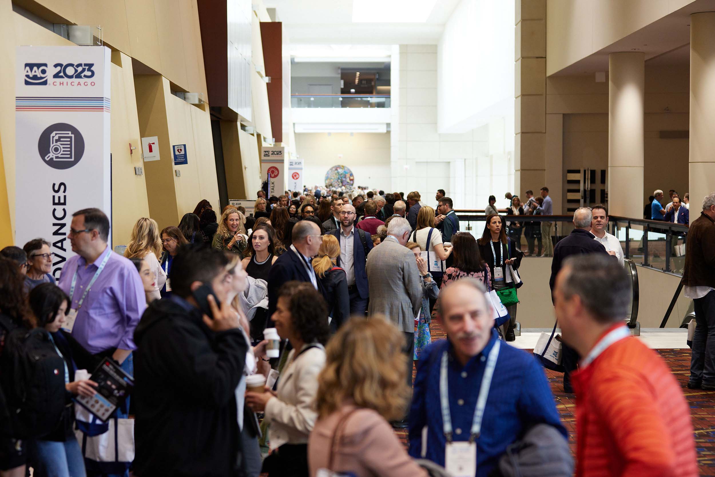Annual Session Conference attendees walking through the convention center.