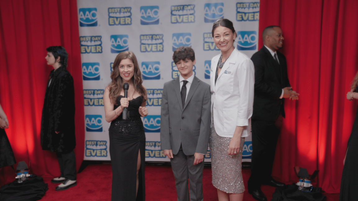 Teenage boy on the red carpet with the host and his orthodontists talking about how getting your braces off at the orthodontist office is the best day ever!