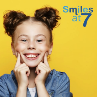 Seven-year-old girl smiling for the camera